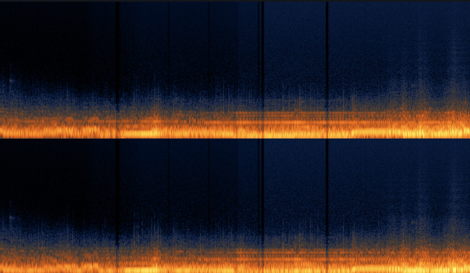 Stereo spectrogram of a loop with DISINT engaged: vertical dark stripes cut through the whole spectrum where dropouts interrupt the signal, while the noise floor glows above the surviving low band